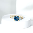 Rosec Jewels-2.25 CT Spiral Shank Engagement Ring with London Blue Topaz and Diamond